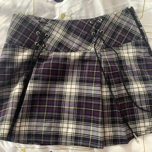 It’s a skirt I bought. It’s purple and grey